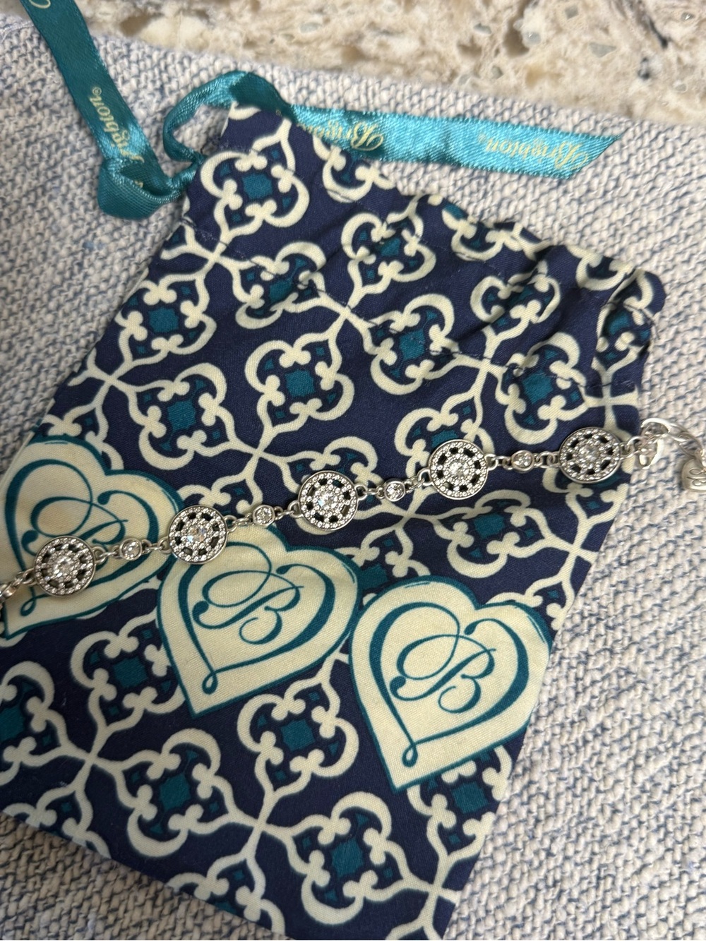 Brighton Silver Crystal Coin Link Bracelet with Navy & Cream Pouch